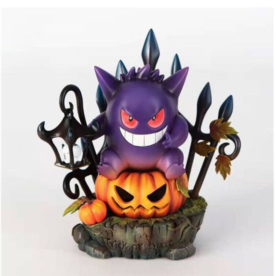 A handmade resin Gengar King figurine sitting atop an illuminated Halloween pumpkin LED light on a dark desk.