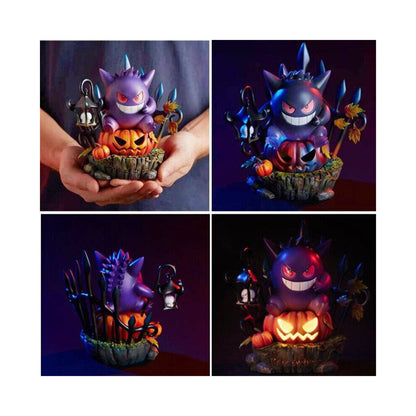 A handmade resin Gengar King figurine sitting atop an illuminated Halloween pumpkin LED light on a dark desk.