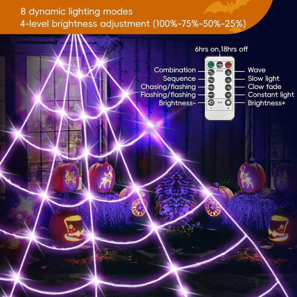 Giant 16-foot purple LED illuminated spider web drapes down a front yard lawn staked into ground at dusk.