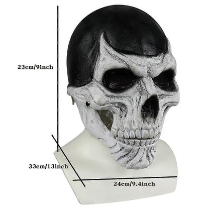 Front view of a full-head black skull costume mask with a realistic articulated moving jaw against a dark studio background.