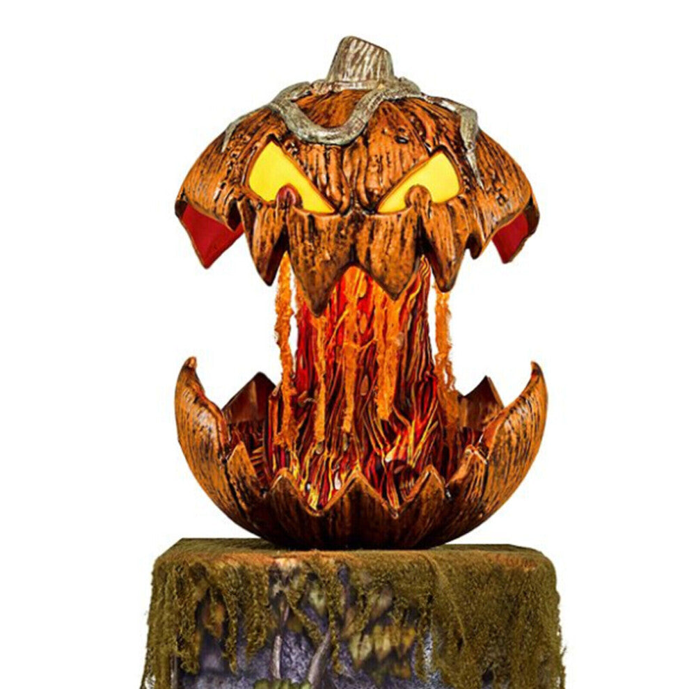 An illuminated Halloween talking animated pumpkin head projector speaker decor glowing on a dark table, showcasing its carved face and festive design.