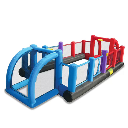 Massive blue and red Happy Hop Inflatable Multi-Sport Arena with built-in football goals and basketball hoop set up on green lawn grass.