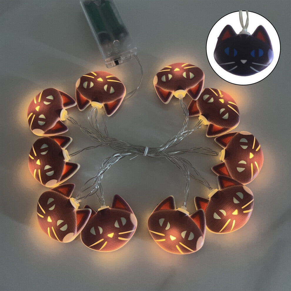 An 118-inch Harliver black cat string light strand with 20 warm LED bulbs glowing softly against a festive wall background.