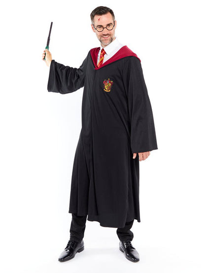 Side profile of an adult wearing a black Harry Potter costume robe with red Gryffindor lining, displaying the pointed hood and full sleeve length.