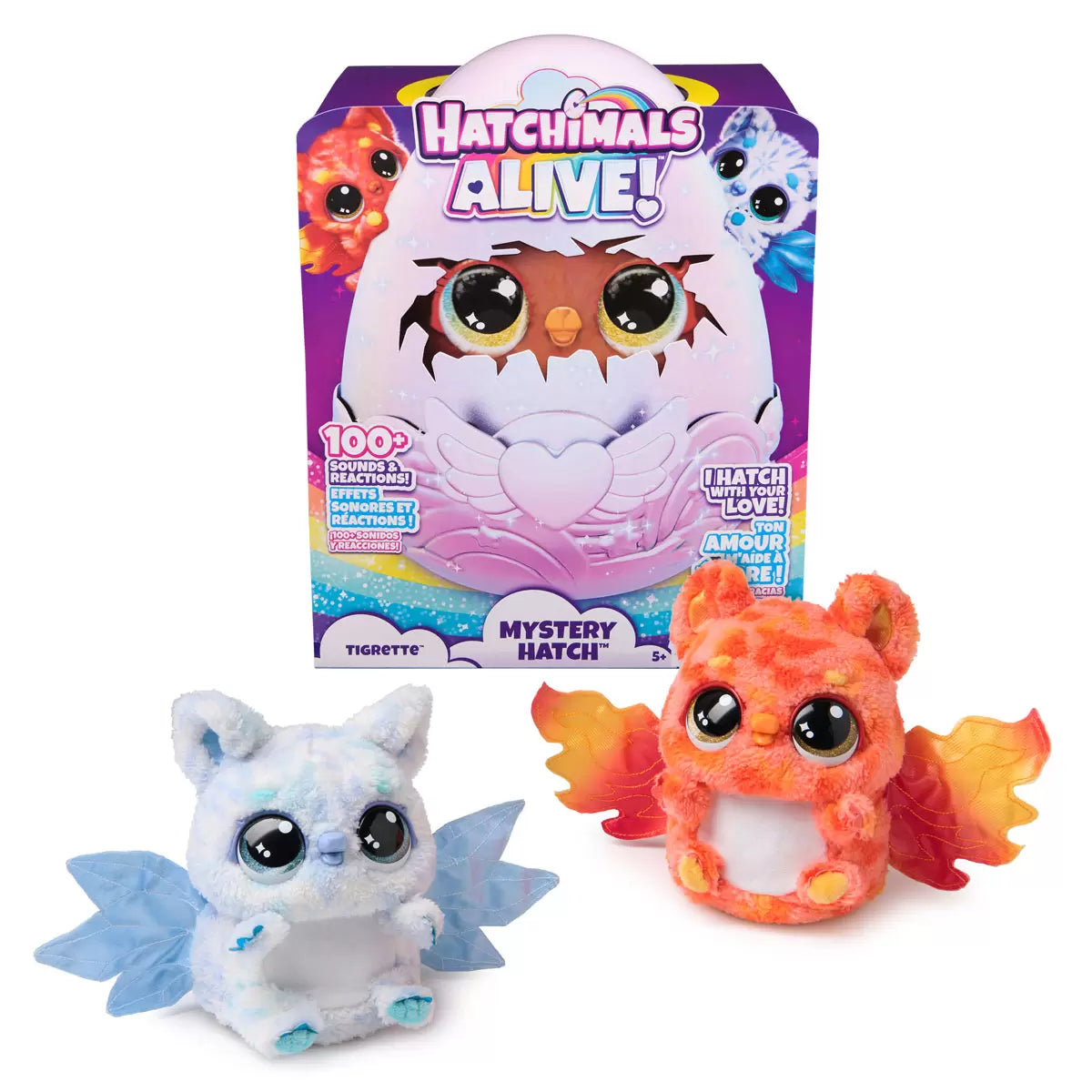 Front view of the large Hatchimals Alive Mystery Hatch egg glowing with rainbow LED lights and releasing mist from the base on a white table.