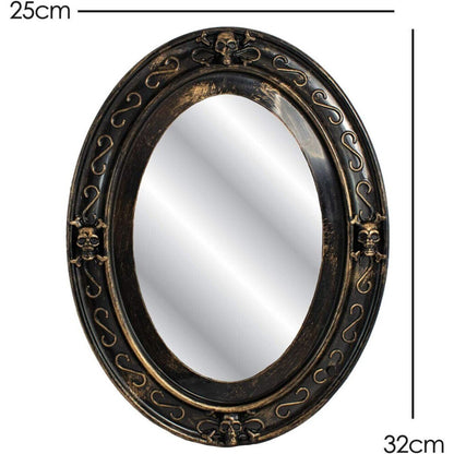 Front view of a vintage-style oval haunted mirror displaying a glowing flashing 3D skull face with red eyes in a dark room.