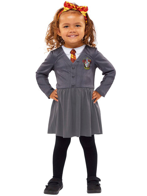Official Hermione Granger baby costume dress featuring printed Gryffindor uniform details and matching headband displayed on a white background.