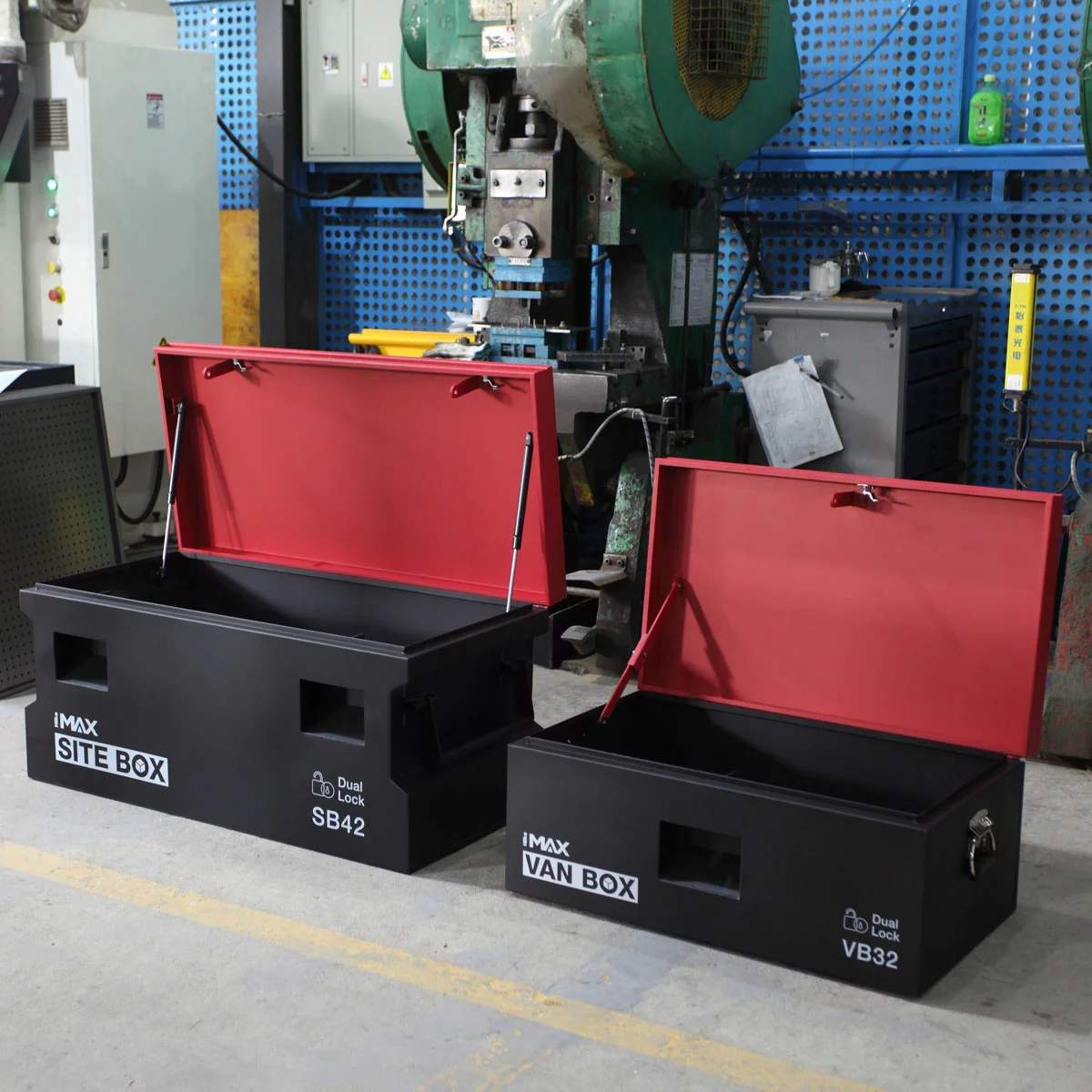 A matching pair of industrial gray steel tool vaults—one 32-inch van box and one 42-inch site box—featuring recessed lock pockets and heavy steel handles.