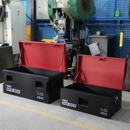 A matching pair of industrial gray steel tool vaults—one 32-inch van box and one 42-inch site box—featuring recessed lock pockets and heavy steel handles.