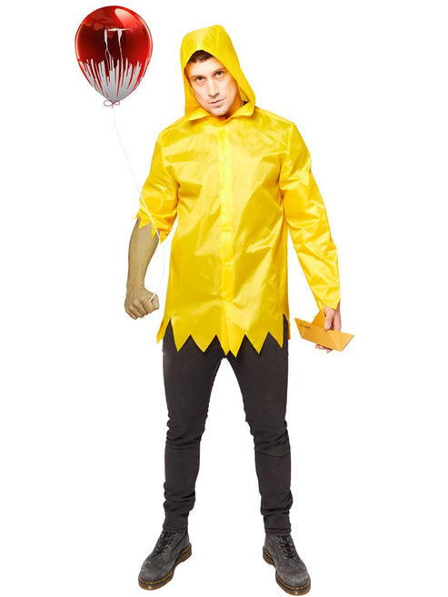 Adult wearing bright yellow IT Georgie raincoat costume with deep hood pulled up against a dark background.