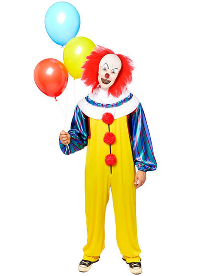 Front view of the full-length IT Pennywise Classic Clown adult costume featuring a bright yellow jumpsuit, red pom-poms, tiered neck ruffle, and sculpted white clown mask.