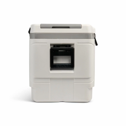 Side angle of the large grey Igloo MaxCold 142L XL cooler on grass with open butterfly hatches on the lid.