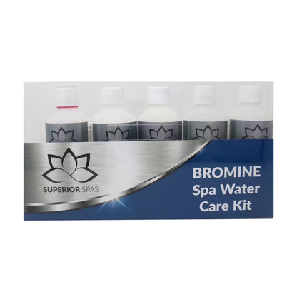 The complete InSpire Premium bromine chemical starter kit, featuring the bromine granules, foam away, pH adjusters, and a tube of 4-in-1 test strips neatly arranged on a clean patio table.
