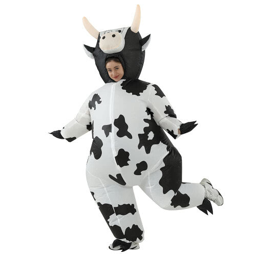 Front view of a fully inflated black and white spot adult cow costume with a cartoon face on a plain background