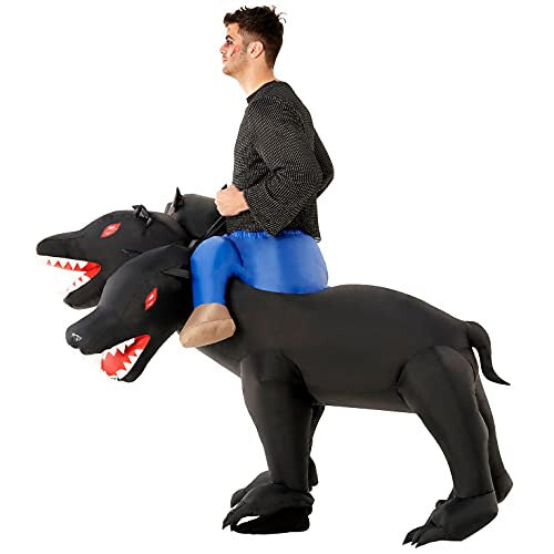 Full-length front view of an adult wearing an inflated brown three-headed Cerberus dog ride-on costume indoors with realistic black leg accents.
