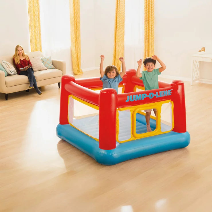 Colorful Intex Jump-O-Lene inflatable bouncy playhouse with high yellow walls and a blue floor.