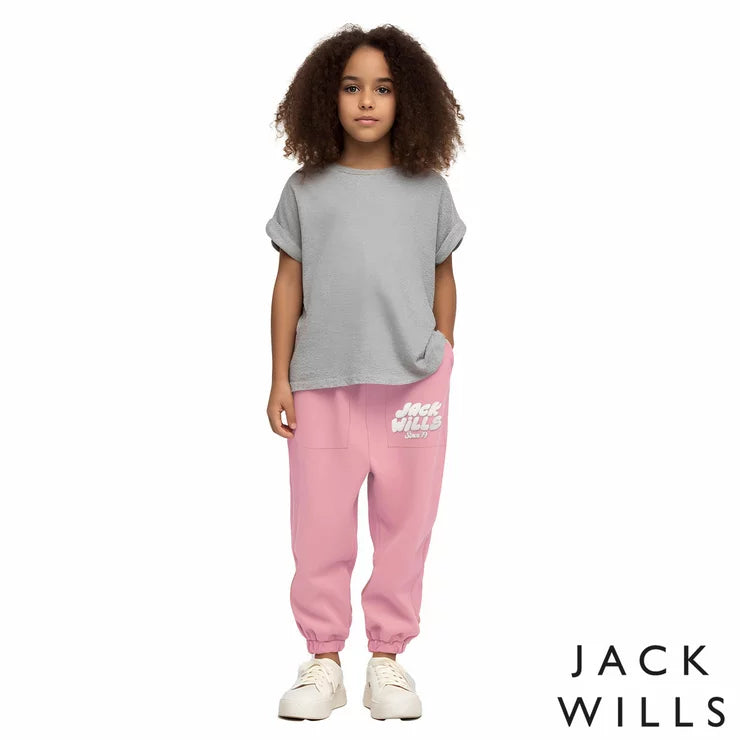 Front view of the Jack Wills Youth Jogger in navy blue, showcasing the tapered leg cut, elasticated cuffs, and jacquard brand logo detail.