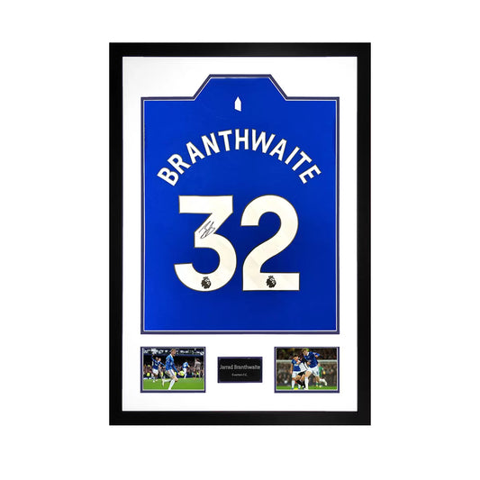 An official Everton 24/25 football shirt signed by Jarrad Branthwaite, displayed in a professional frame with two action photos and authentication documentation.