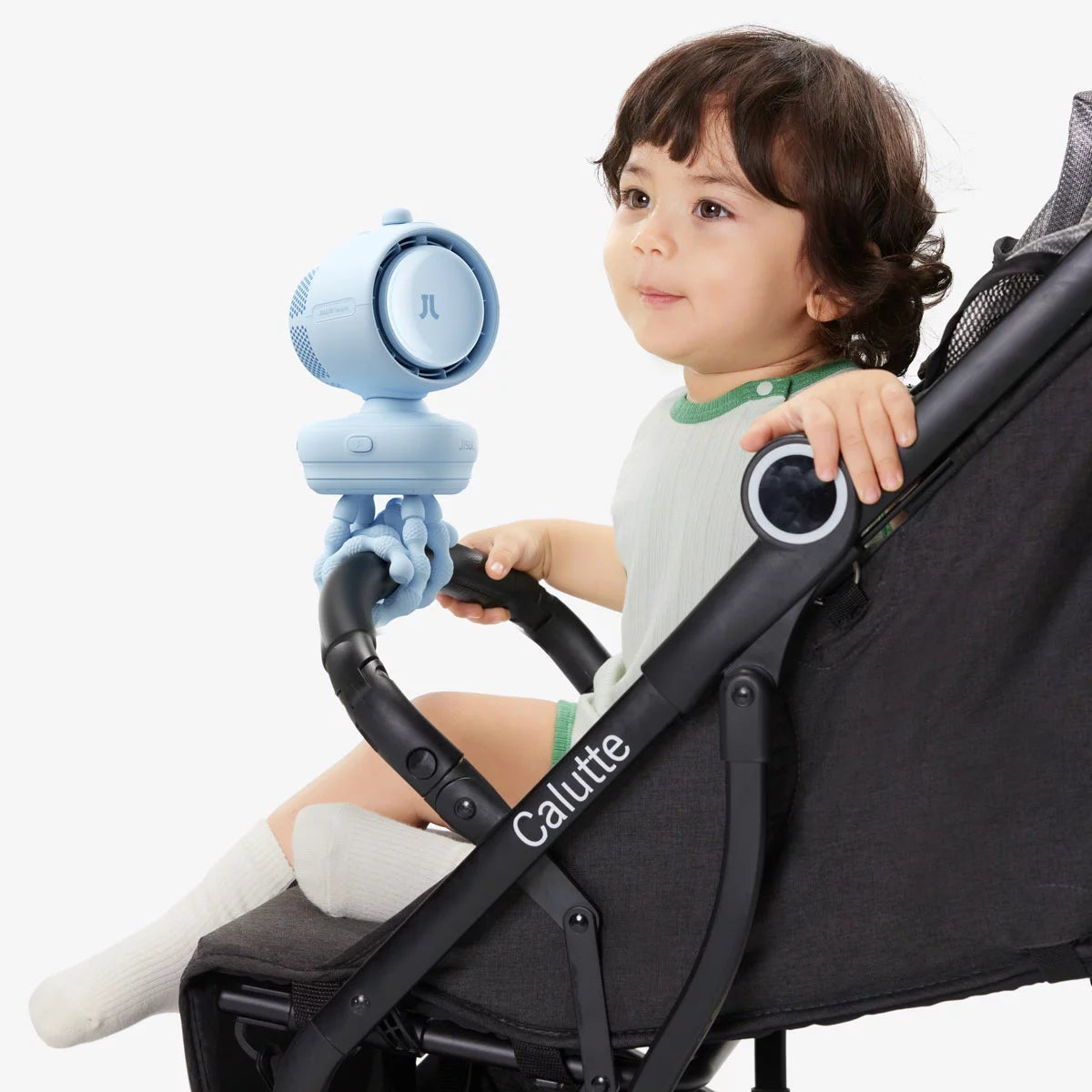 Blue JisuLife Stroller Fan 3 attached to a stroller handlebar with silicone legs, showing the LED digital display and blue housing.