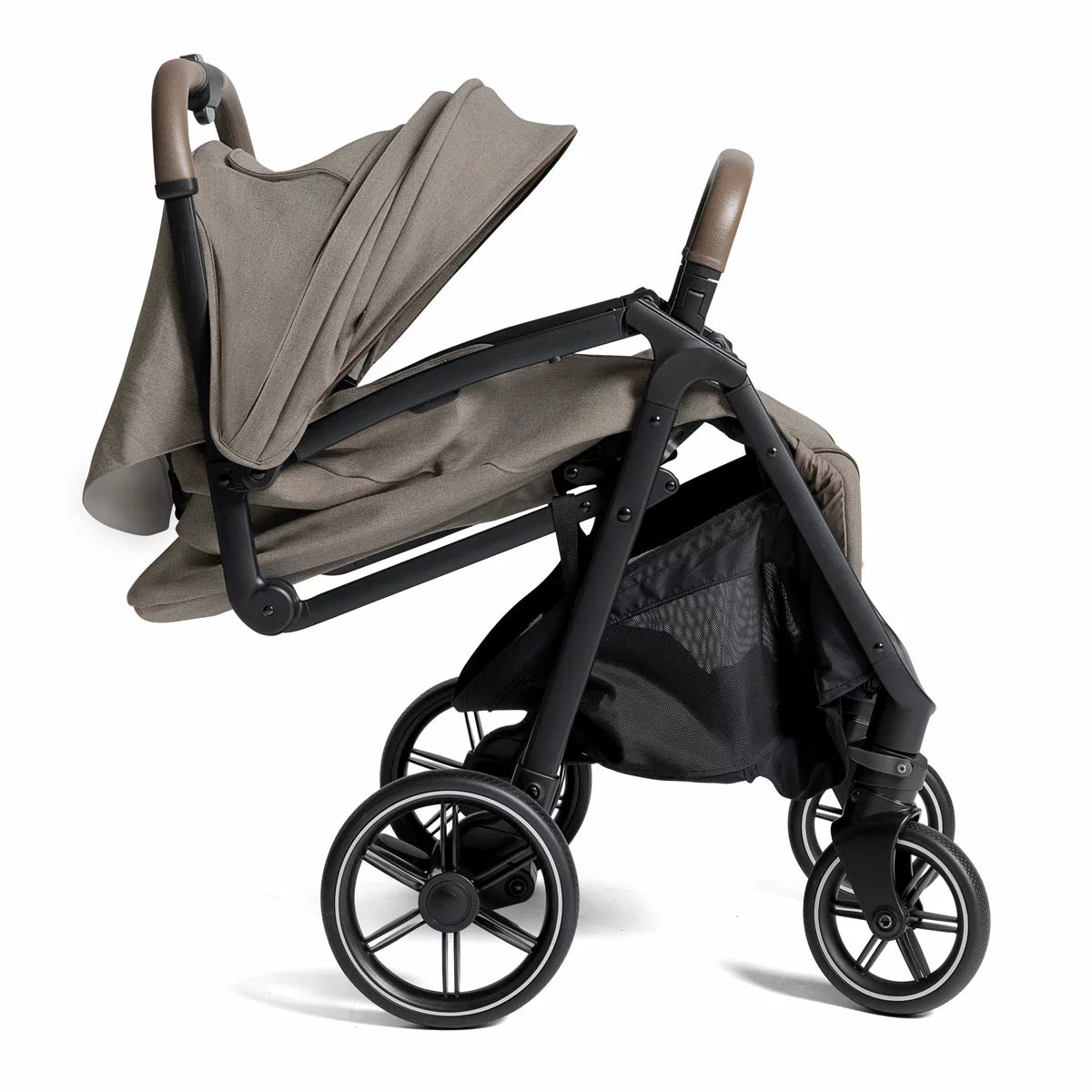 Joie Signature Parcel LX stroller in Maple colorway folded down into its ultra compact travel carry bag
