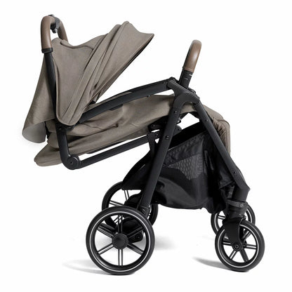 Joie Signature Parcel LX stroller in Maple colorway folded down into its ultra compact travel carry bag