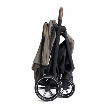 Joie Signature Parcel LX stroller in Maple colorway folded down into its ultra compact travel carry bag