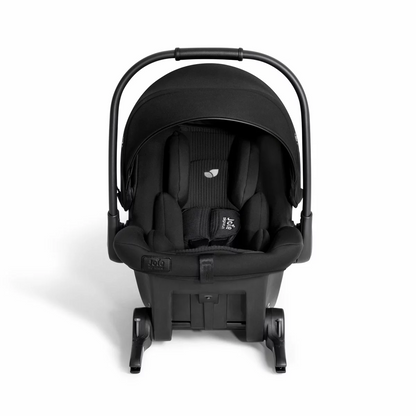 Joie Sprint Signature infant carrier showing the integrated green-guided ISOFIX arms extended for direct car anchoring.