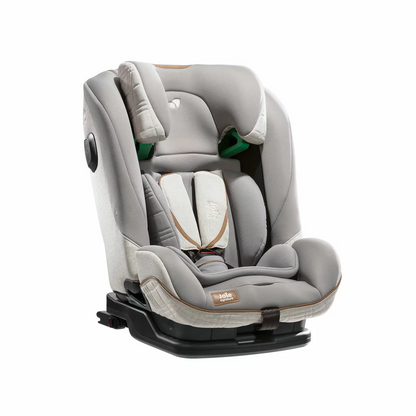 Joie i-Penti Signature booster car seat in a premium gray fabric displaying the extended Tri-Protect headrest and steel-reinforced frame.