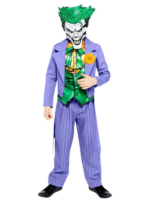 Front view of a child wearing the purple Joker comic costume with attached green vest and trousers against a neutral studio backdrop.