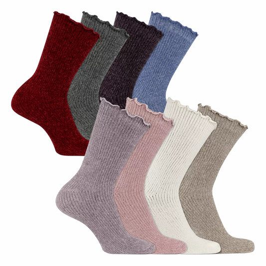 Flat lay of K Bell ladies chenille crew socks in soft pink, cream, and grey showcasing the plush velvety texture and delicate lettuce edge cuffs on a wooden background.