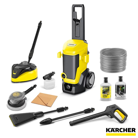 Yellow and black Kärcher K7 pressure washer setup outdoors on a clean stone patio with T7 patio cleaner, lances, and detergent bottles.