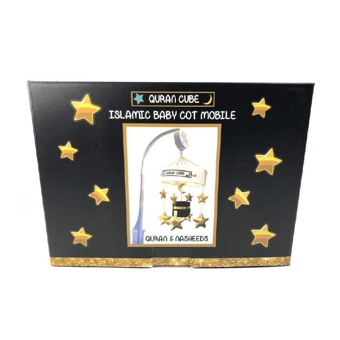 White baby cot mobile attached to a wooden crib rail featuring a plush central Kaaba surrounded by hanging golden stars and crescent moon plushies.