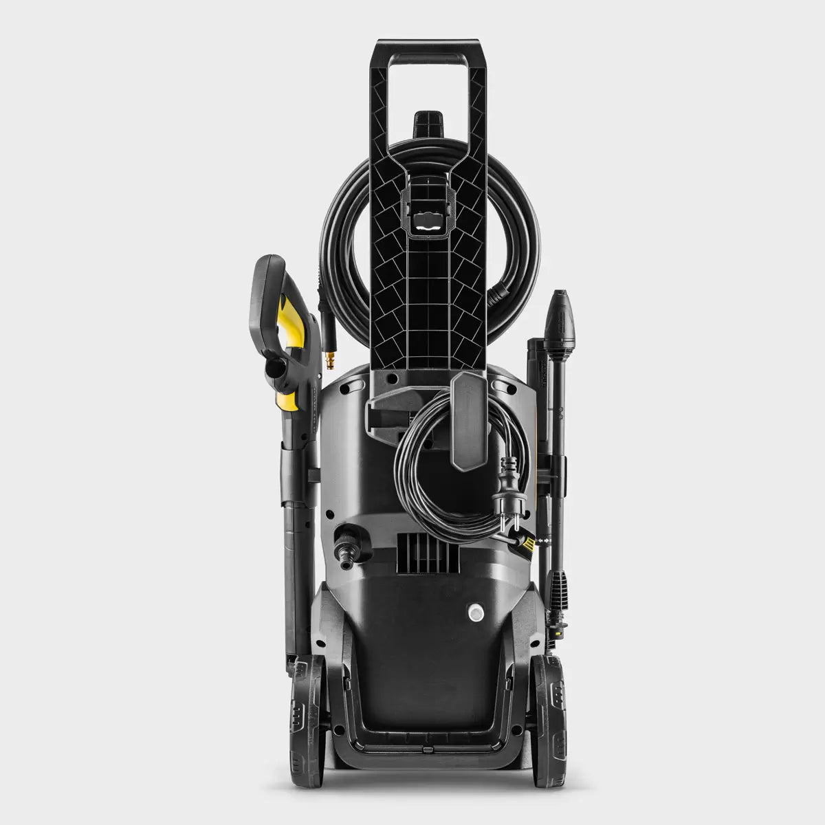 Karcher K5 WCM car and home pressure washer bundle cleaning a vehicle and outdoor patio with high-pressure water spray