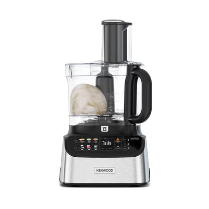 The Kenwood MultiPro OneTouch FDM73.480SS processor and blender in a modern kitchen, featuring the digital scale interface and various included attachments.