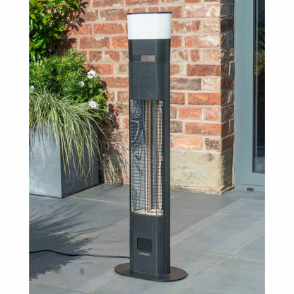 Kettler Kalos Ibiza floor standing garden heater in dark grey finish with illuminated LED ring and built-in speaker standing on a wooden patio deck.