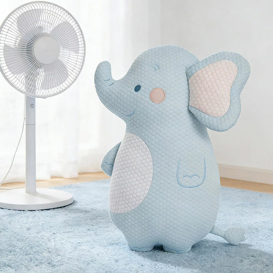 Zoobies Kids Cooling Animal Pillow in cute giraffe shape displayed on a bed showing textured cooling cover and plush filling.