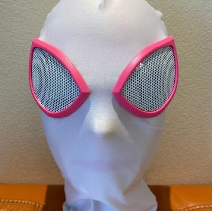 Front view of a kids red and blue webbed spandex superhero mask showing molded rubber eye frames, available in 6 distinct character designs.