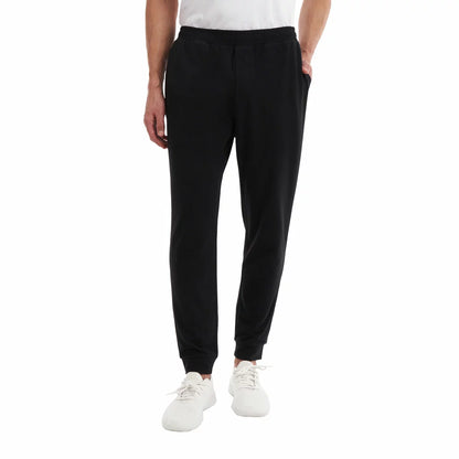 Front view of Kirkland Signature Men's lounge joggers in classic dark navy featuring tapered ankles and an adjustable drawcord.