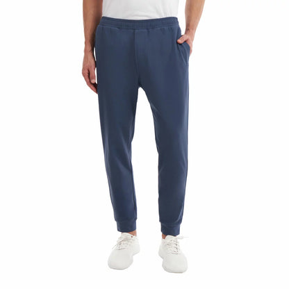Front view of Kirkland Signature Men's lounge joggers in classic dark navy featuring tapered ankles and an adjustable drawcord.