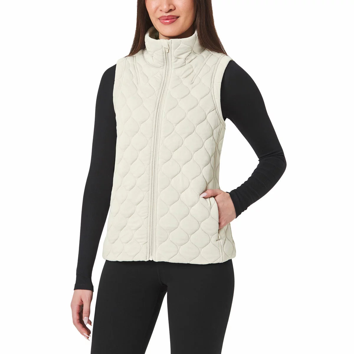 Kirkland Signature Women's Quilted Vest featuring lightweight quilted insulation, full-zip front closure, and comfortable everyday layering design.