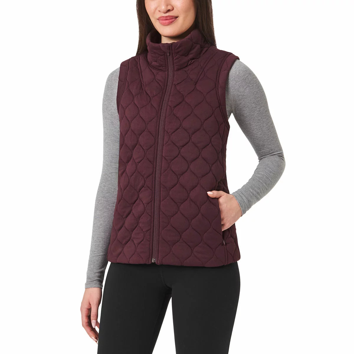 Kirkland Signature Women's Quilted Vest featuring lightweight quilted insulation, full-zip front closure, and comfortable everyday layering design.
