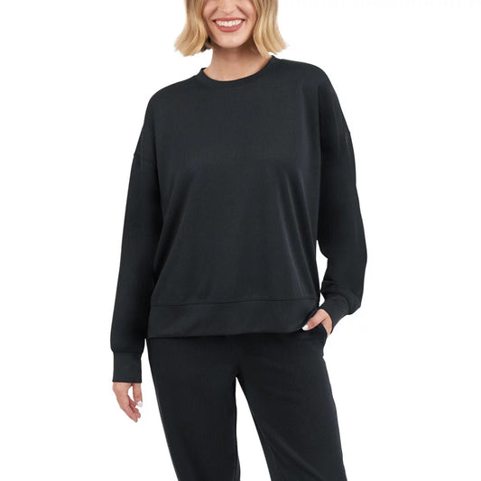 Kirkland Signature women's ribbed crewneck sweatshirt displaying heavy textured knit fabric in neutral grey on a minimalist backdrop.