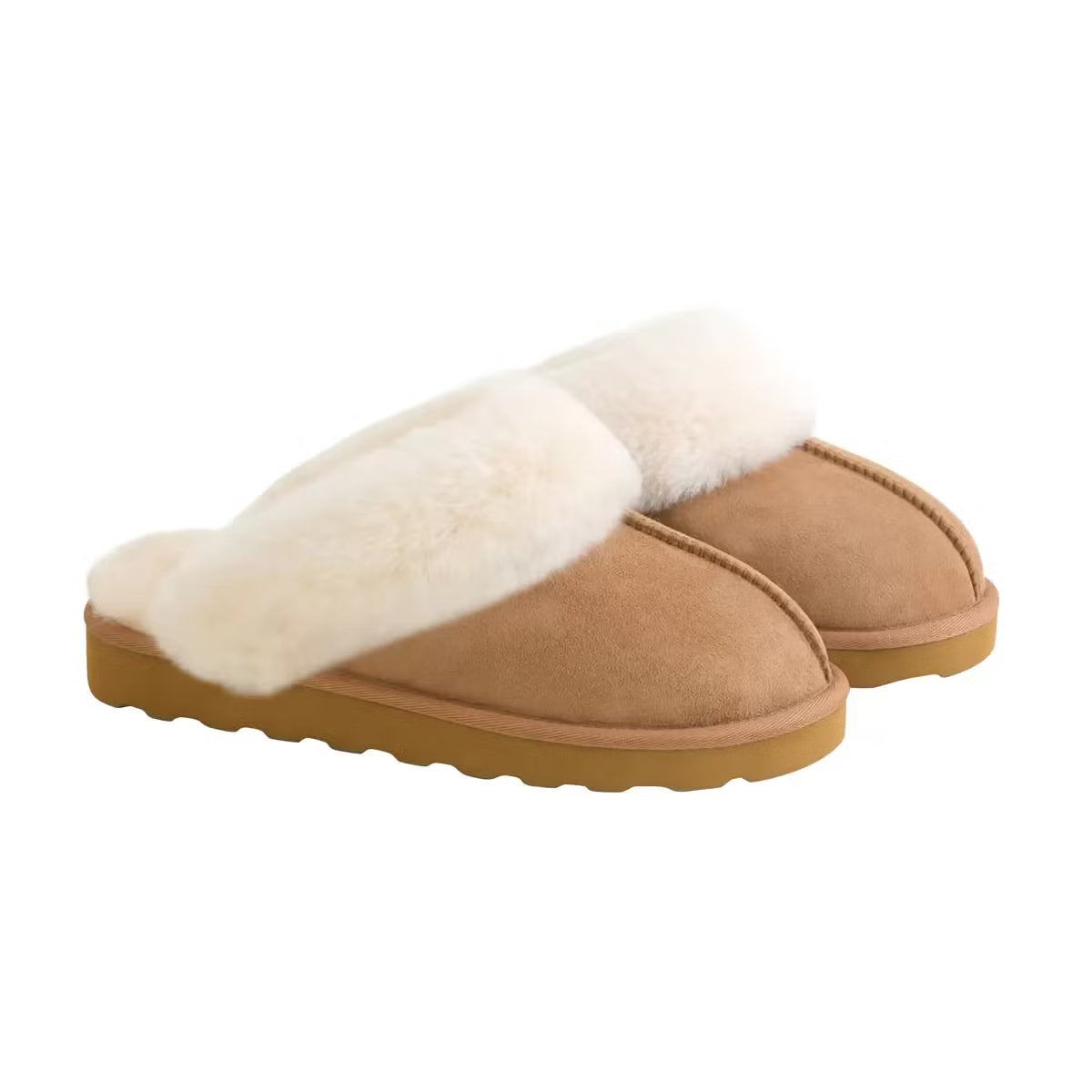 Pair of tan chestnut Kirkland Signature Women's Shearling Slippers featuring plush white wool lining resting on a light wooden floor.
