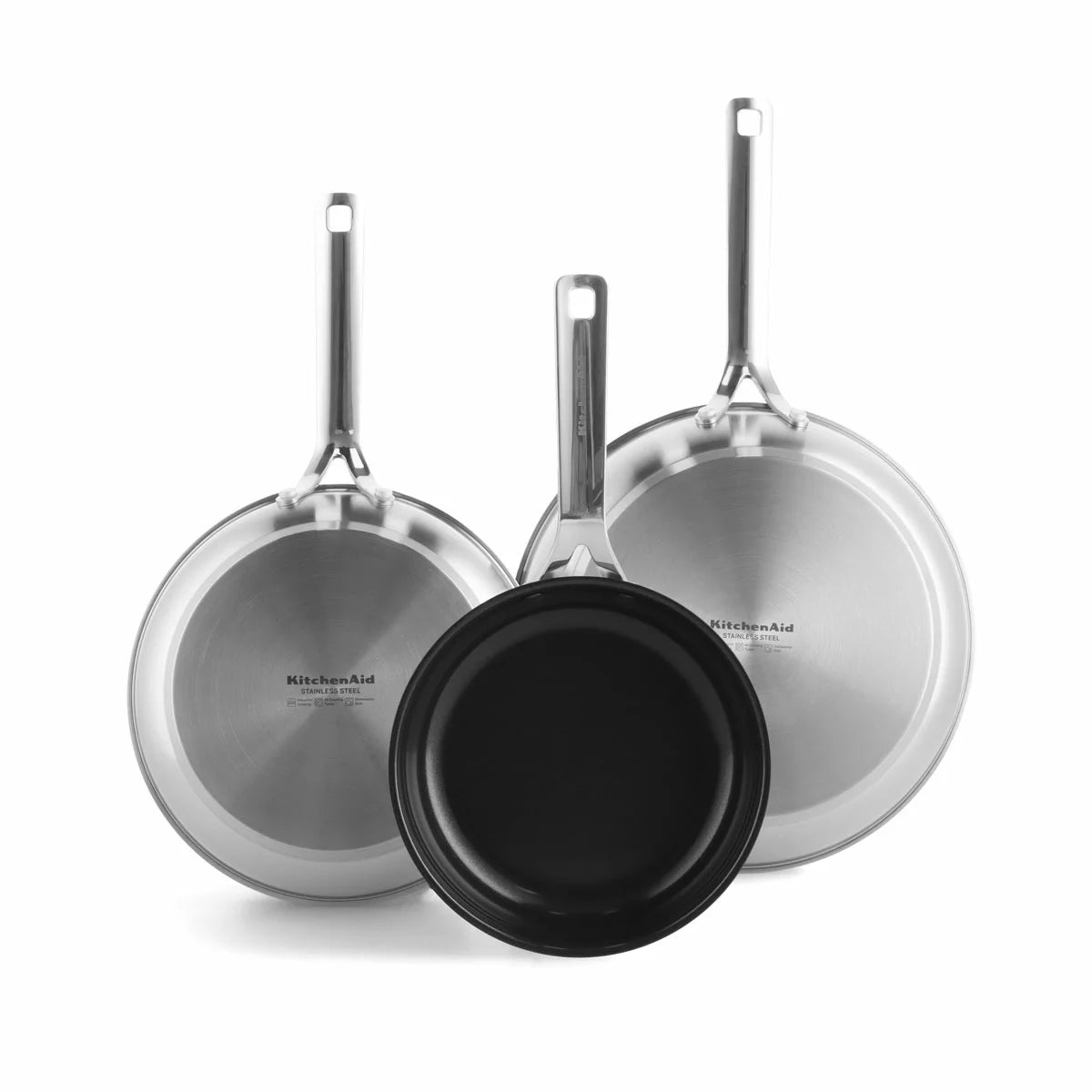 Close-up of the KitchenAid stainless steel pan featuring the ceramic non-stick surface and induction base.