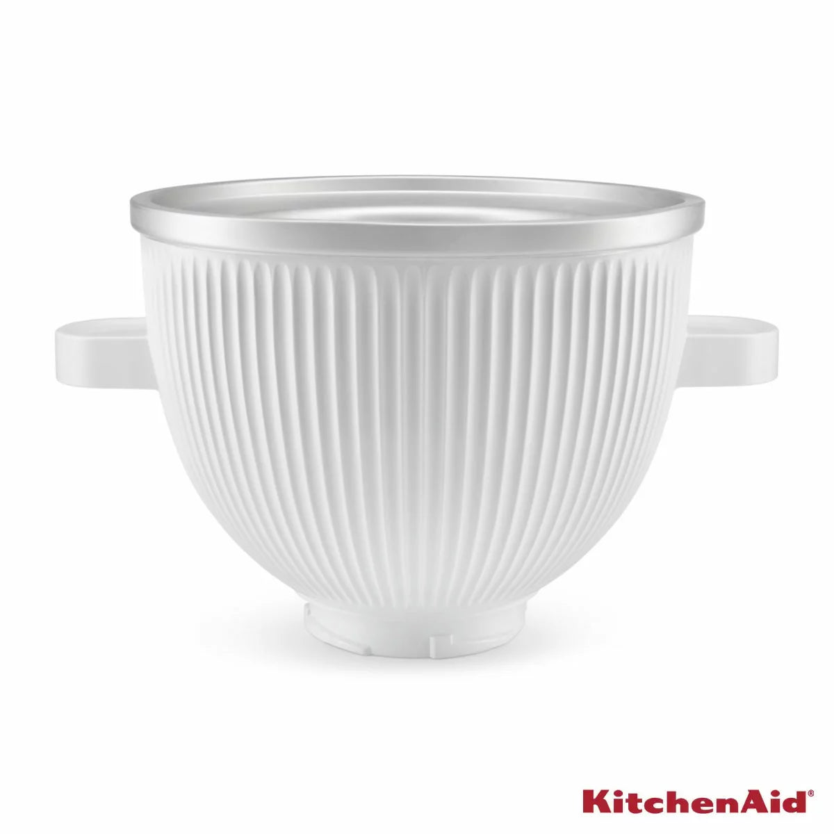 Side angle view of the white KitchenAid 5KSMICM ice cream maker bowl and churning dasher attachment mounted on a countertop stand mixer.