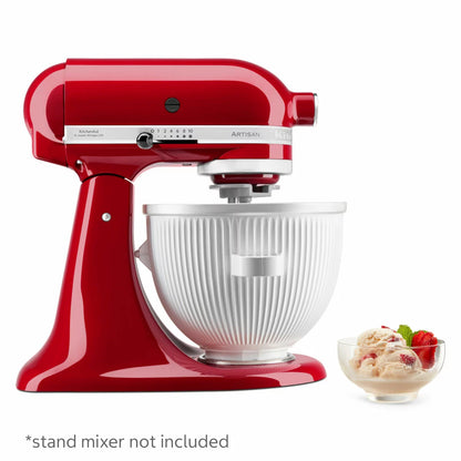 Side angle view of the white KitchenAid 5KSMICM ice cream maker bowl and churning dasher attachment mounted on a countertop stand mixer.