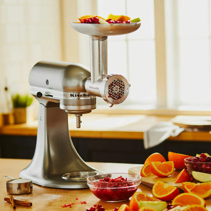 KitchenAid 5KSMMGA Meat Grinder and Sausage Stuffer Set attached to KitchenAid stand mixer for homemade meat grinding and sausage making