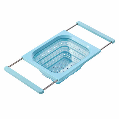 KitchenAid collapsible colander in grey and red showing space-saving flat design for kitchen storage.