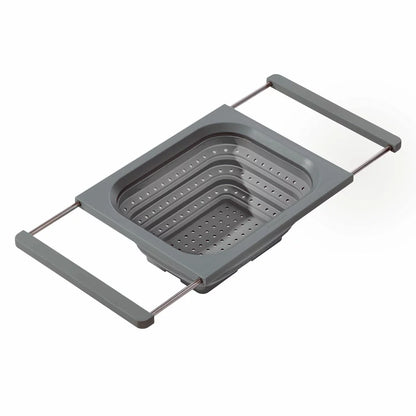 KitchenAid collapsible colander in grey and red showing space-saving flat design for kitchen storage.