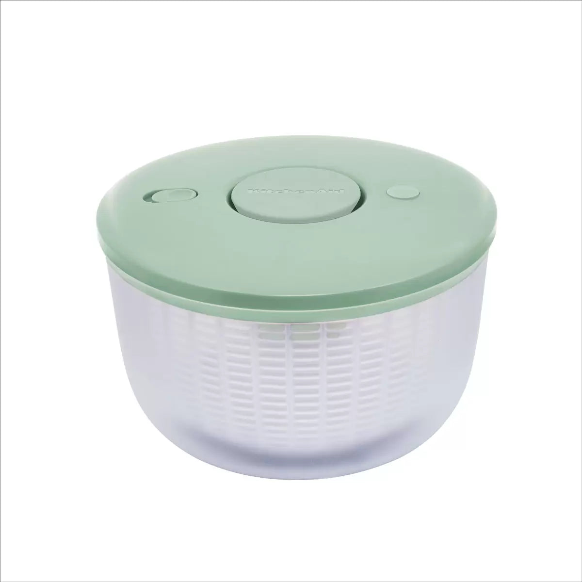 KitchenAid Salad Spinner in red and black available, demonstrating the pump-action drying mechanism on a clean kitchen countertop.